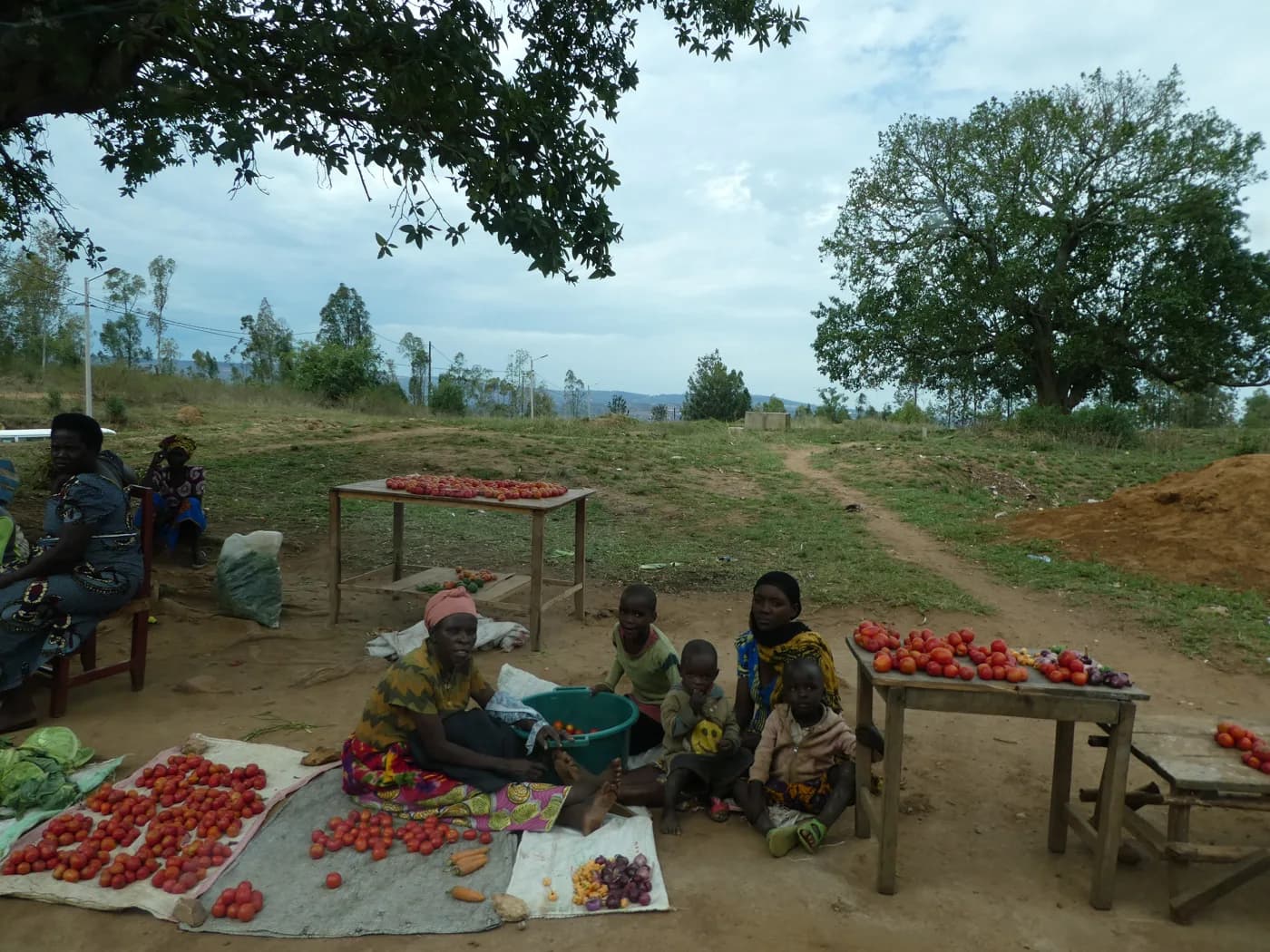A family selling fresh vegetables in a village in Rwanda